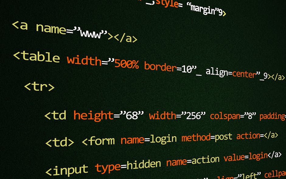 A close-up view of a modern laptop with a sleek metallic body and a large screen displaying lines of code in a text editor, with visible syntax highlighting in various colours such as blue, green, and